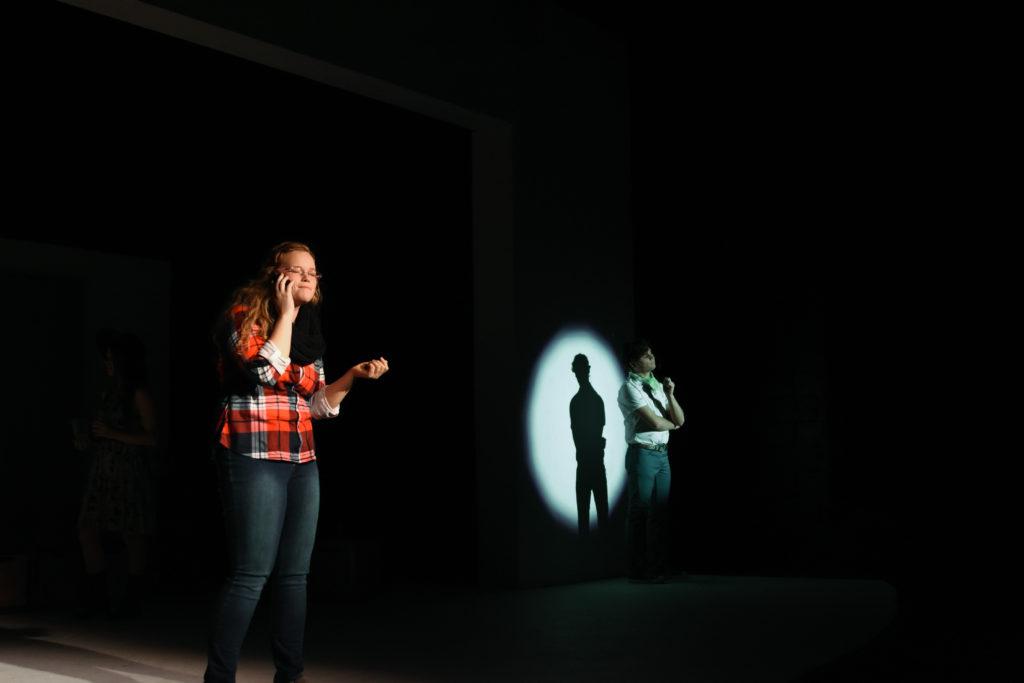 6427 -- From left, Noah Hutchins and Diandra Cahall play the call center man and Jenni Jensen, respectively, in Campbellsville University's most recent play “The Ver**zon Play.” The play was open for public viewing at Campbellsville University's Russ Mobley Theater Feb. 21-24. (Campbellsville University Photo by Ariel C. Emberton)