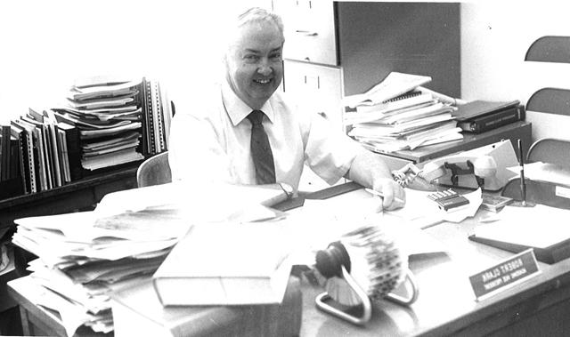 Dr. Robert S. Clark works at his desk in the Administration Building in the 1980s. (Campbellsville University Photo by Ayo Olaniyan)