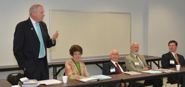  Mike Eastridge, second from left, listens to Chris Withers, CU's campaign consultant, at a recent CU Board of Trustees meeting. From left are trustees Dr. Joel Carwile, Eastridge, Paul Osborne and Shirley Whitehouse. (Campbellsville University Photo by Joan C. McKinney)