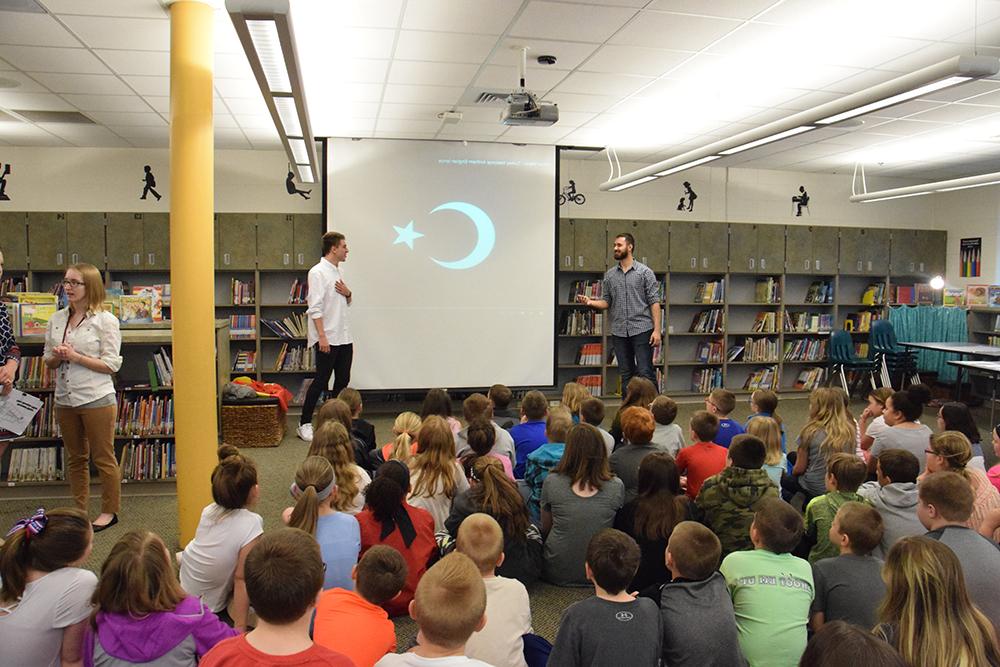 Campbellsville University students speaking to students at Green County Intermediate School include from left: Muslum Can “John” Kaya of Turkey, Miguel Angel Galindo Imboden of Spain and Keliah Coverstone of Burkesville, Ky. (Campbellsville University Photo by Shelby Hall)